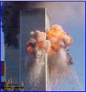 A fireball explodes from one of the World Trade Center towers after a jet airliner crashed into the building Tuesday, Sept. 11, 2001, in New York. (AP Photo/Carmen Taylor)